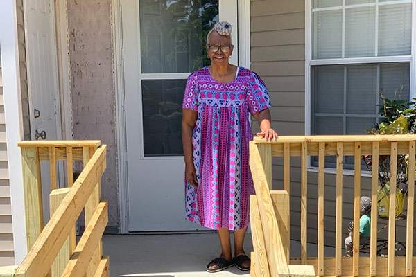 Person standing on their porch
